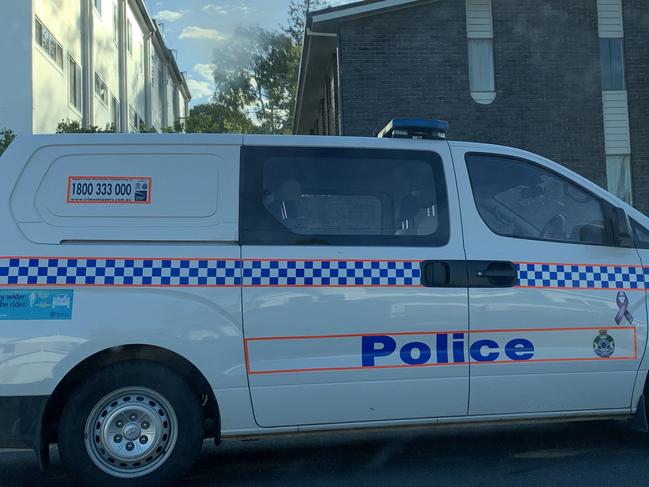 Police outside a Gladstone residence where the body of a person was discovered this afternoon.