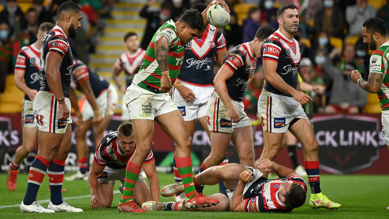 Latrell Mitchell stands over Fletcher Baker after scoring a try. Picture: NRL Photos