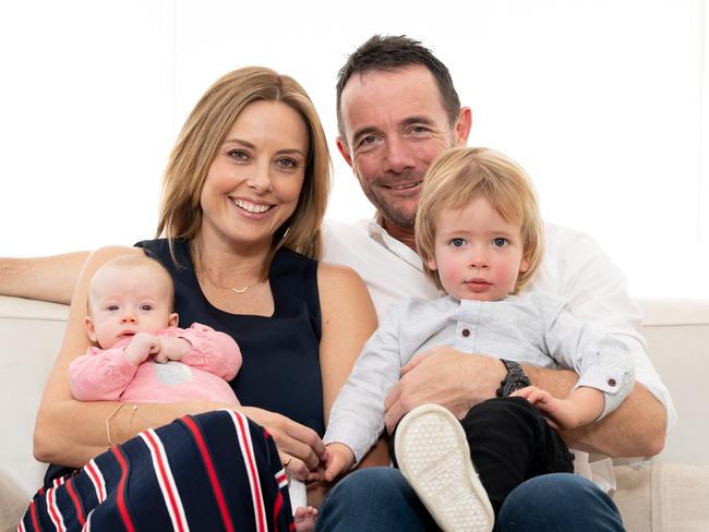 AAP   WENTWORTH COURIERAllison Langdon, Mike Willesee pose for a photo with their children, baby Scout and Mack, 2 at their home in Bronte on Saturday May 25 2019. Allison is an ambassador for RU OK and is doing the Anytime Fitness treadmill challenge to raise funds. (AAP IMAGE / MONIQUE HARMER)