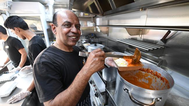 Raymond Gomes in his food truck at Victoria University, Werribee Campus. Picture: Julian Smith