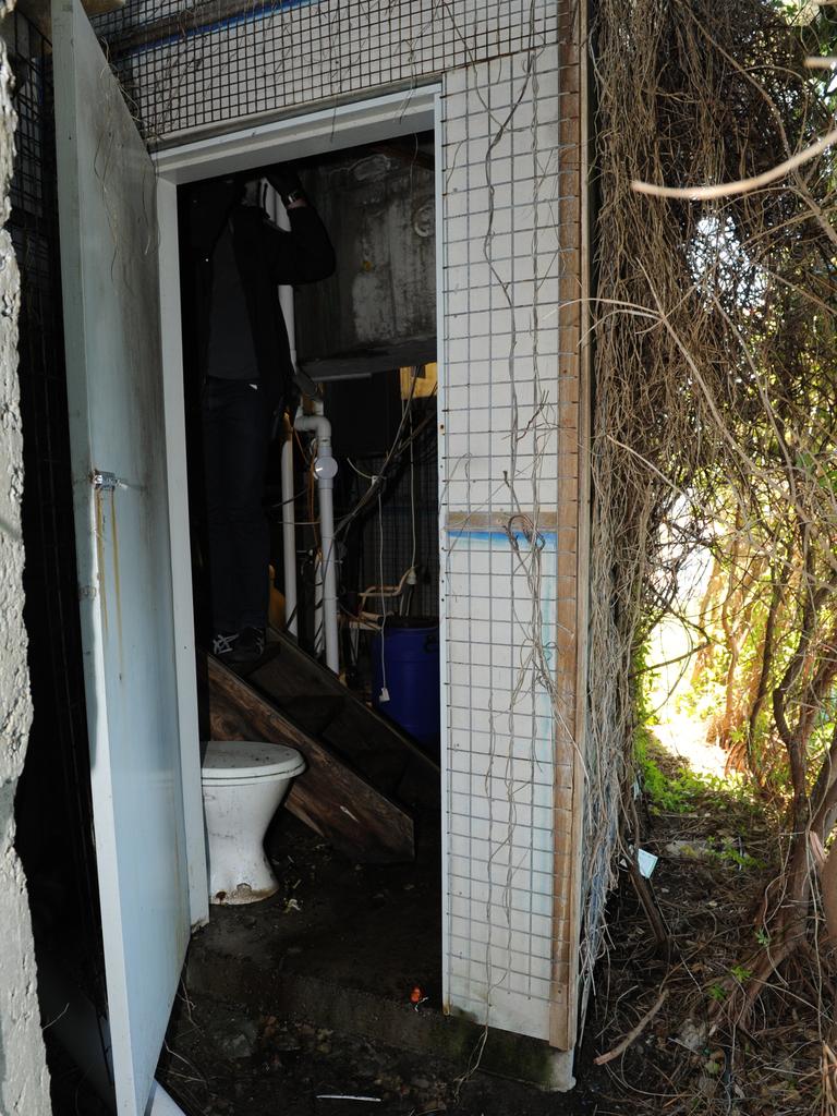 The door opened onto think bushland and makeshift path that linked to the public boardwalk on Dover Heights reserve.