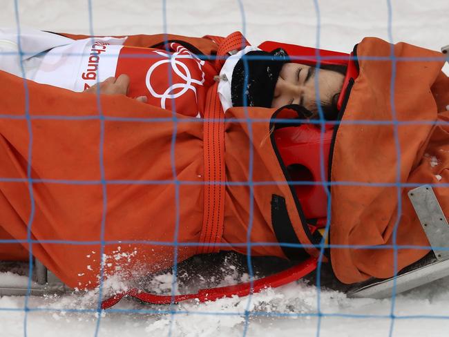 Yuto Totsuka of Japan is stretched off by medical staff after crashing in the during the Snowboard Men’s Halfpipe Final on day five of the PyeongChang 2018 Winter Olympics at Phoenix Snow Park on February 14, 2018 in Pyeongchang-gun, South Korea. Picture: Getty Images