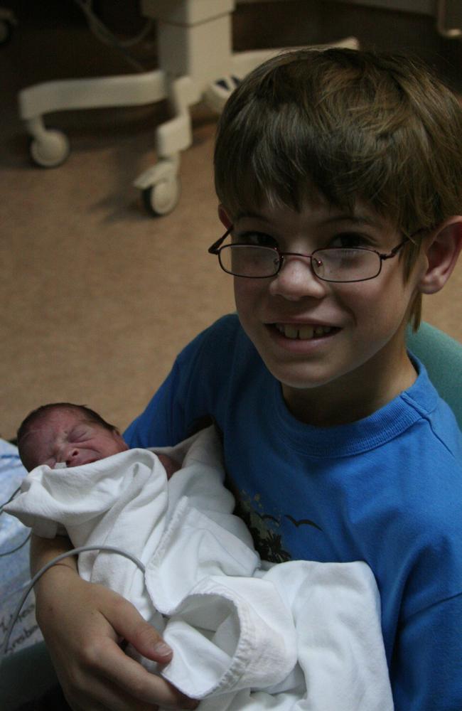 Caleb’s first cuddle with Karen Messmer. Picture: Contributed