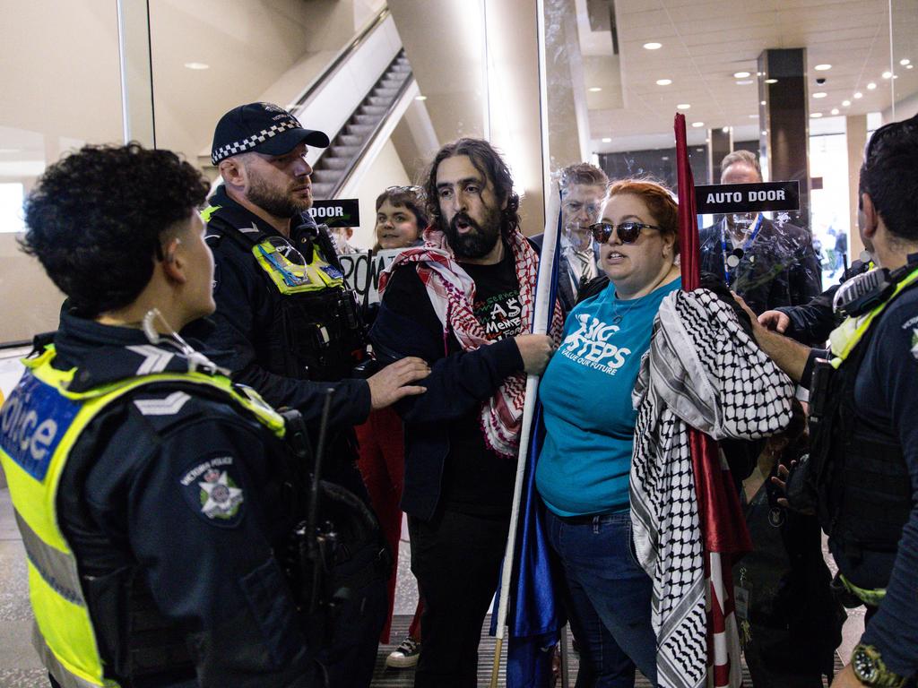 About 30 protesters shouted at state ministers. Picture: Diego Fedele