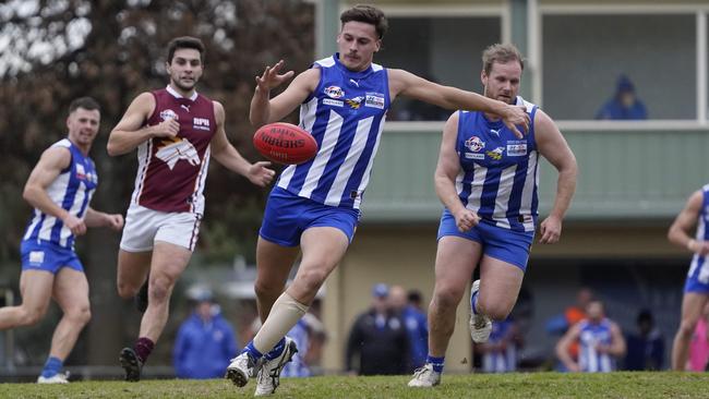 EFL: Ferntree Gully’s Jack Flannery gets a kick away. Picture: Valeriu Campan