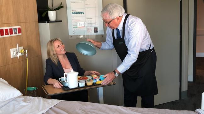 Health Minister and Wakehurst MP Brad Hazzard serves breakfast to Manly Daily reporter Julie Cross. Picture: Supplied.