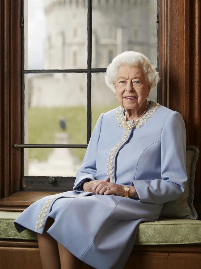 The official Platinum Jubilee portrait of Queen Elizabeth II was photographed at Windsor Castle recently. The portrait, by Mr Ranald Mackechnie, was taken in the Victoria Vestibule at Windsor Castle. Captured in the background are the Castle’s Round Tower, and the statue of King Charles II which stands in the Quadrangle of the Castle. Picture: Royal Household/Ranald Mackechnie via Getty Images