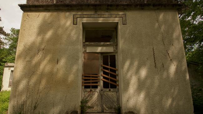 Boarded up and crumbling buildings at the Garden of Tropical Agronomy near Paris. Picture: Seph Lawless