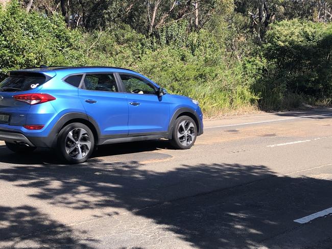 Road damage on Wakehurst Parkway at Seaforth on Thursday. Picture: Jim O'Rourke