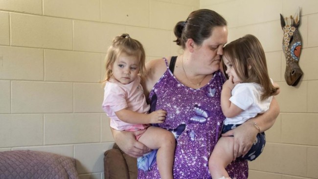 Cairns mum Jade with her daughters Rhylee, who she claims broke her leg at childcare, and  Maddy. Picture: Cairns Post