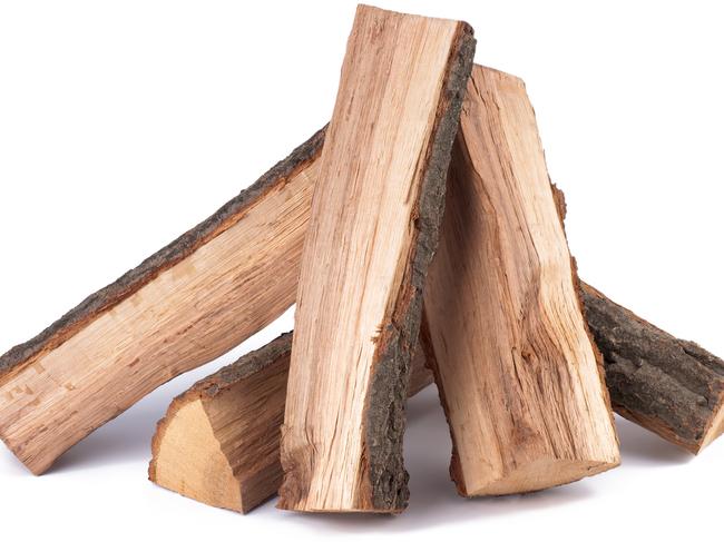 Stack of firewood on white background