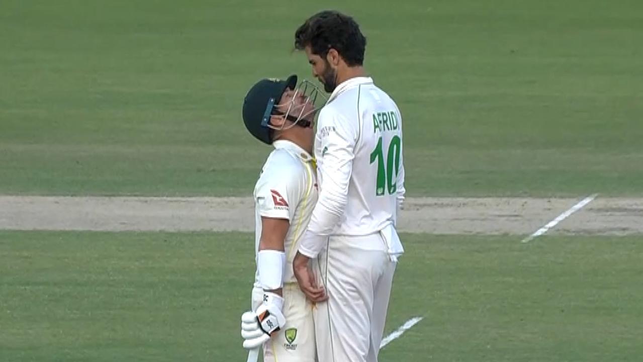 Shaheen Shah Afridi stands over David Warner following the final delivery of day three of the third Test in Lahore. Photo: Fox Sports