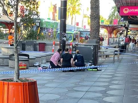 Police attempting to revive a man after a fight at Acland St, St Kilda St. Picture: Supplied