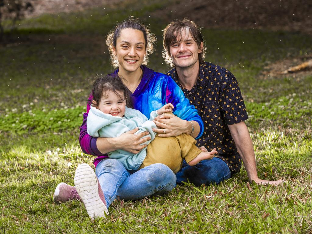 Valkyrie Quinn, 4, pictured with her parents Jenaya and Simon, has brain damage after nearly drowning in a dam. Picture: NIGEL HALLETT