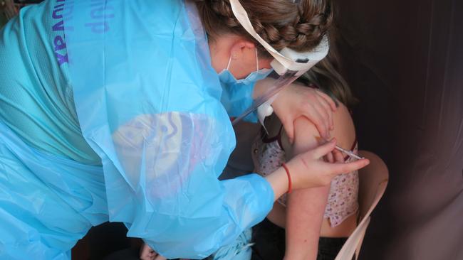 Alison Brown, 15, receiving her Pfizer vaccination. Picture: Lauren Ferri