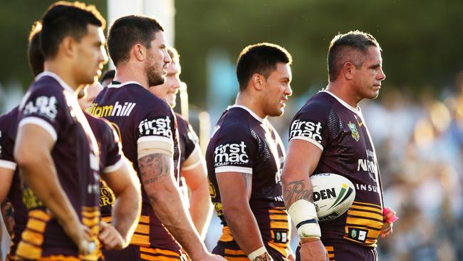 Corey Parker (right) and the Broncos look on after a Sharks try.