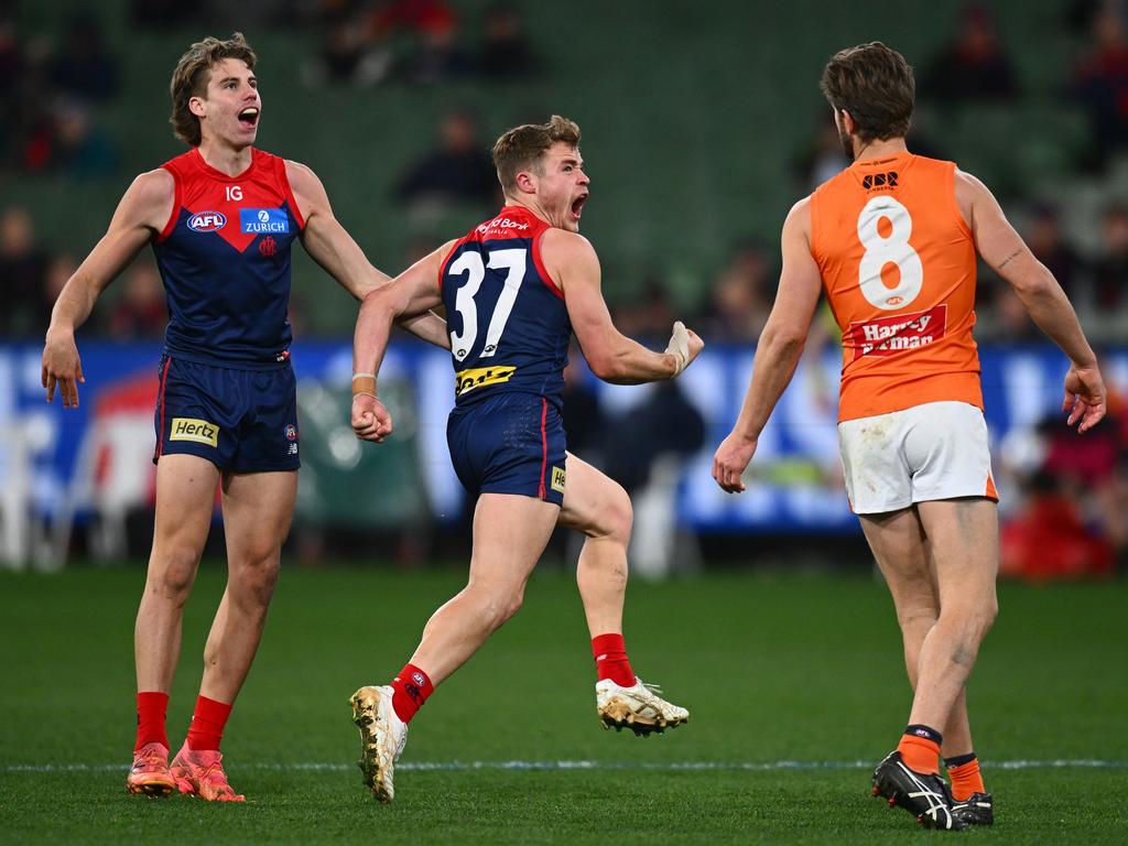 Kade Chandler celebrates a goal as Melbourne made a late charge. Picture: Morgan Hancock/AFL Photos