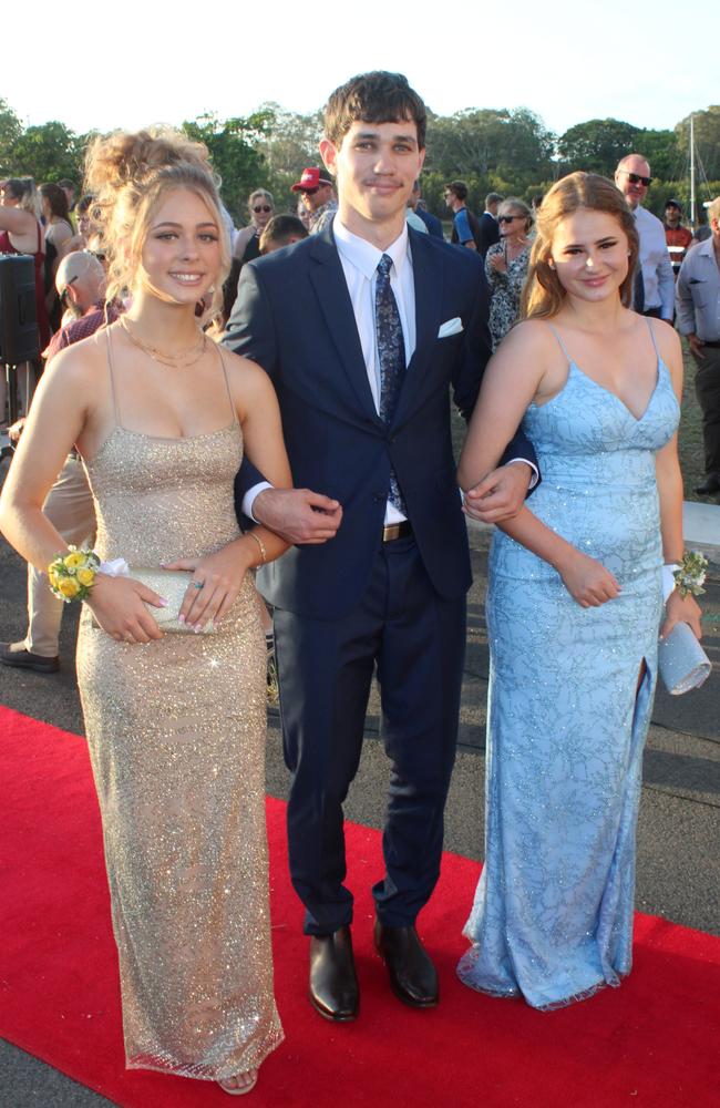 Jazabelle Newton, Ella Perry and Drew Kitt at the 2023 Gin Gin State High School Formal.