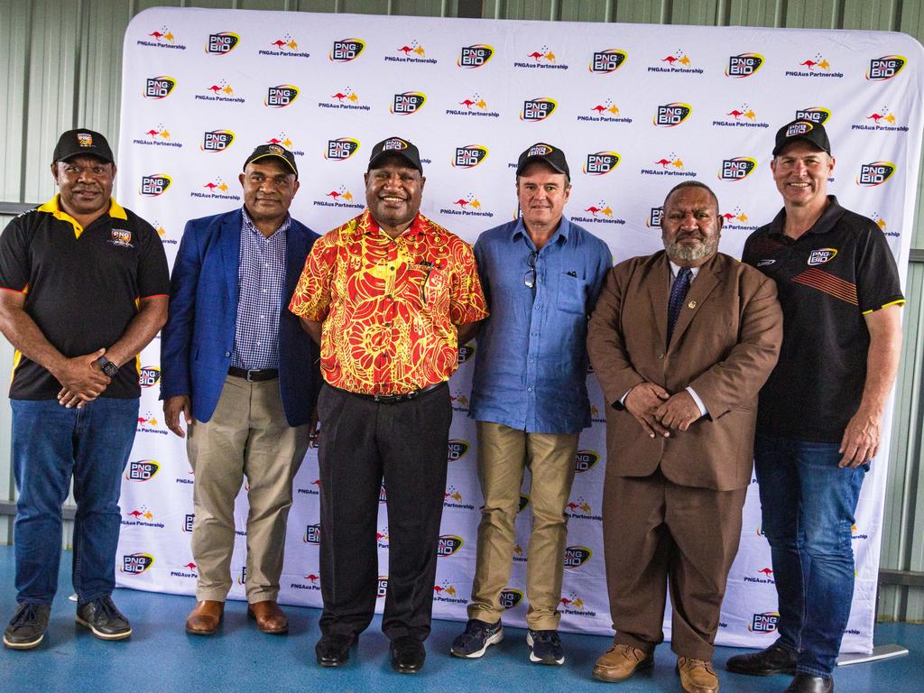 (L-R) PNG RL CEO Stanley Hondina, PNG NRL bid chairman Wapu Sonk, Prime Minister James Marape, PNG High Commissioner John Feakes, PNG RL chairman Sandis Tsaka and NRL bid CEO Andrew Hill.