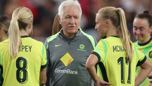 GLENDALE, ARIZONA - FEBRUARY 23: Head coach Tom Sermanni of Australia speaks with his team after being defeated by the United States in the 2025 SheBelieves Cup match at State Farm Stadium on February 23, 2025 in Glendale, Arizona. (Photo by Chris Coduto/Getty Images)