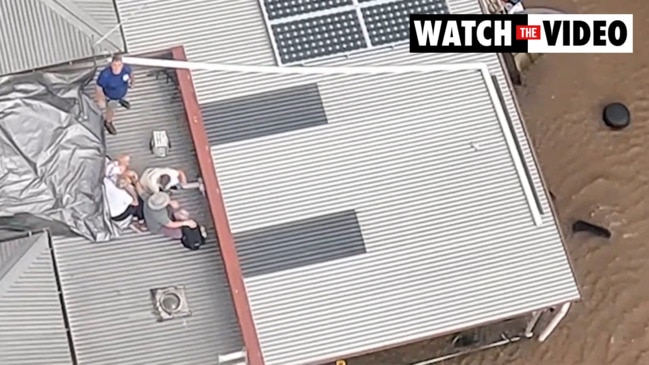 Family Winched From Rooftop Near Ballina as Floodwaters Surround Home