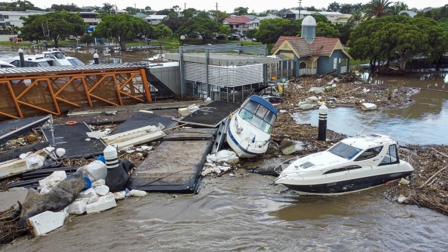 Damaged boats and tonnes of debris is littered across the Sunshine State. Picture: Peter Wallis/Getty Images