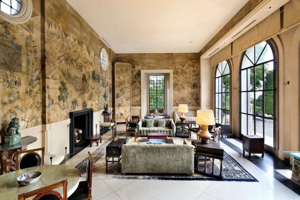 One of the many living spaces, with French windows. Picture: Realtor