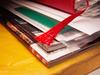 THINKSTOCK ONE TIME ONLY Stack of files and magazines