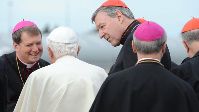 Then a bishop, Anthony Fisher, left, met Pope Benedict XVI with Cardinal Pell (3rd R) when he arrived in Sydney for World Youth Day celebrations in 2008.