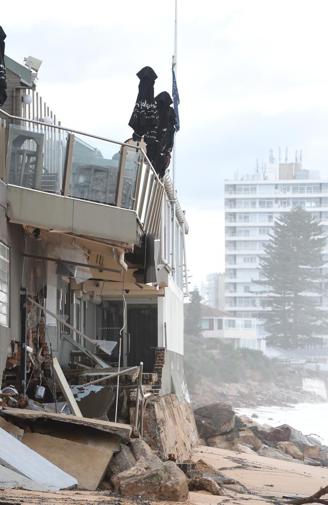 Swallowed by the sea: The damaged Beach Club at Collaroy. Picture: AAP Image/Dean Lewins