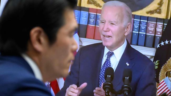 An image of Joe Biden speaking at a press conference in response to Robert Hur’s report is seen on a monitor as the special counsel testifies before the House judiciary committee in March. Picture: AFP