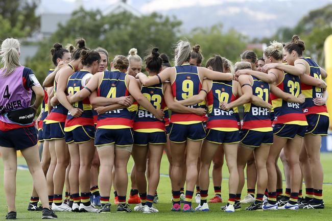 Crows players huddle before the start of the match AFLW against the GWS Giants at Peter Motley Oval.. Picture Sarah Reed.