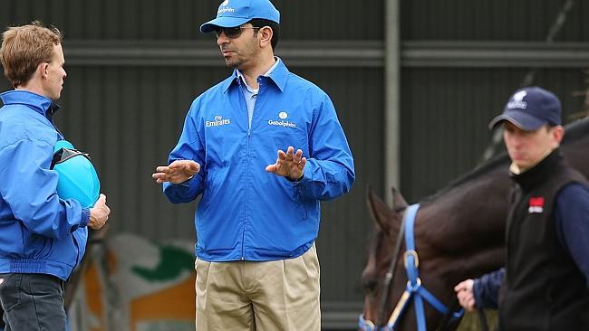 Jockey Kerrin McEvoy and Royal Empire trainer Saeed bin Suroor talk during trackwork. Picture: Getty Images