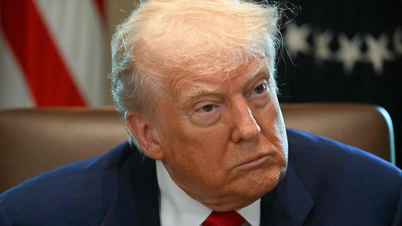 US President Donald Trump looks on during a cabinet meeting in the Cabinet Room of the White House in Washington, DC, on April 30, 2025. (Photo by Jim WATSON / AFP)