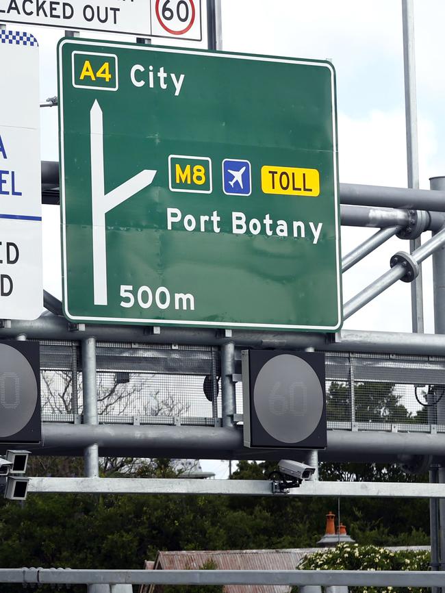 Signage at the start on the new Rozelle Interchange on Victoria Rd. The word TOLL on the signage led to motorists avoiding the free tunnel linking the Iron Cove Bridge and the Anzac Bridge, which bypasses Victoria Road, resulting in a huge traffic queue. Picture: Richard Dobson