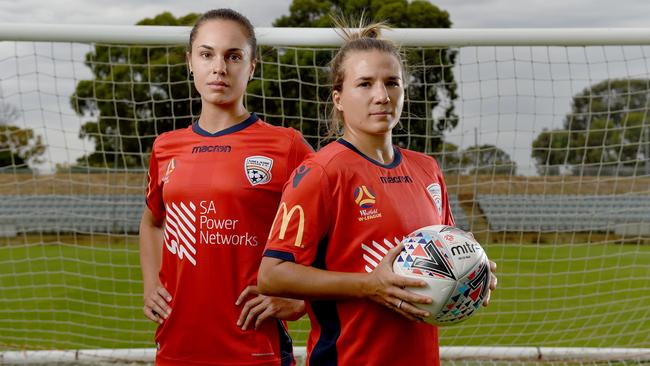 Adelaide United centre backs Emma Checker and Amber Brooks have led the Reds to the cusp of the W-League finals. Picture: Naomi Jellicoe