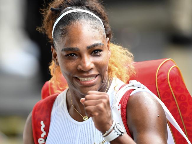 TOPSHOT - US player Serena Williams gesture as she leaves the court after beating Czech Republic's Barbora Strycova during their women's singles semi-final match on day ten of the 2019 Wimbledon Championships at The All England Lawn Tennis Club in Wimbledon, southwest London, on July 11, 2019. (Photo by Daniel LEAL-OLIVAS / AFP) / RESTRICTED TO EDITORIAL USE