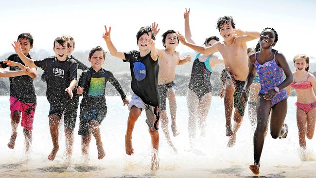 Students from Currumbin Valley State School cool off at Currumbin Alley. Pic by Luke Marsden.