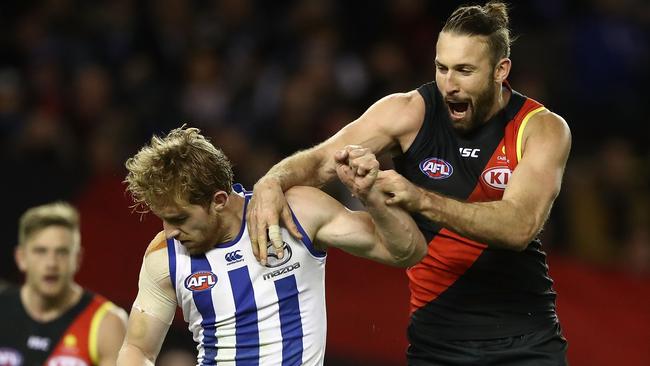 Cale Hooker taps the head of Daniel Nielson as he celebrates a goal. Picture: Getty Images