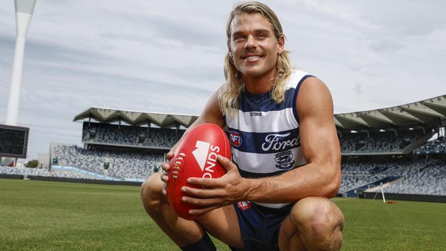 Bailey Smith tries on the hoops for the first time after being traded to Geelong from the Western Bulldogs. Picture: Michael Klein