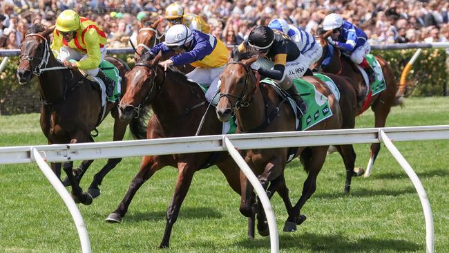 Amokura (yellow/red) finished powerfully behind Deny Knowledge and Osmose in the TAB Matriarch Stakes at Flemington. Picture: George Sal–Racing Photos