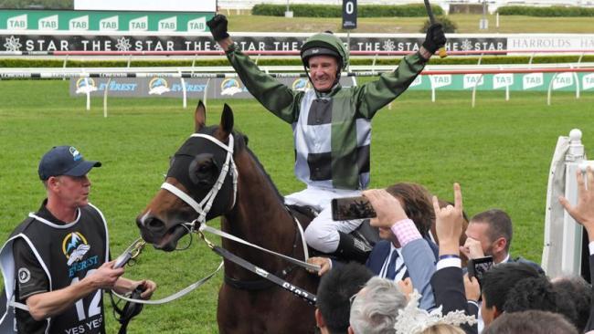 Glen Boss salutes the crowd after his win on Yes Yes yes.