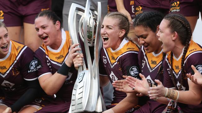 The Broncos pose with the trophy after winning the 2019 NRLW grand final against St George Illawarra. Picture: Getty Images