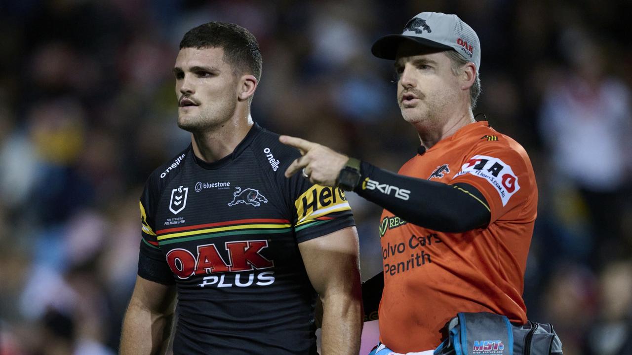 PENRITH, AUSTRALIA - JUNE 04: Nathan Cleary of the Panthers is assisted from the field with an injury during the round 14 NRL match between Penrith Panthers and St George Illawarra Dragons at BlueBet Stadium on June 04, 2023 in Penrith, Australia. (Photo by Brett Hemmings/Getty Images)