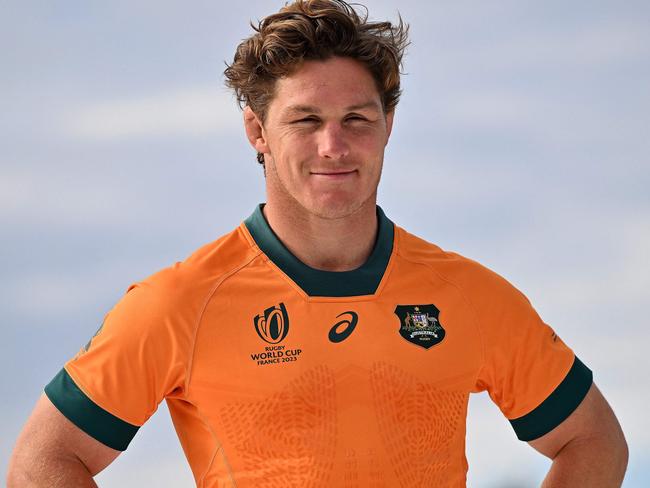 (FILES) Australiaâs Michael Hooper poses during the 2023 Rugby World Cup jersey launch media event in Sydney on June 22, 2023. Michael Hooper, who holds the record for the most caps as Australia captain, put an end to his international rugby career on June 30, 2024, after missing out on selection for the Paris Olympics.  The 32-year-old, who played 125 Tests for the Wallabies - 69 of them as skipper - announced his immediate retirement on social media. (Photo by Saeed KHAN / AFP) / -- IMAGE RESTRICTED TO EDITORIAL USE - STRICTLY NO COMMERCIAL USE --