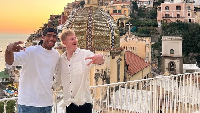 Collingwood players Isaac Quaynor and John Noble pictured on the Amalfi Coast in Italy.