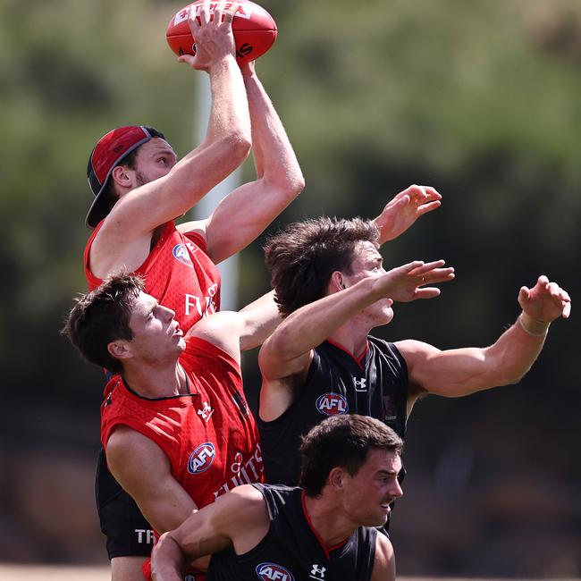 Jordan Ridley climbs above a pack to mark Picture: Michael Klein