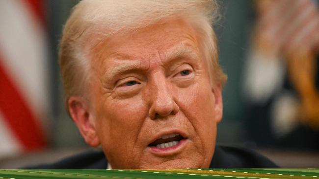 US President Donald Trump is pushing for interest rates to come down. Picture: NewsWire / Jim WATSON / POOL / AFP