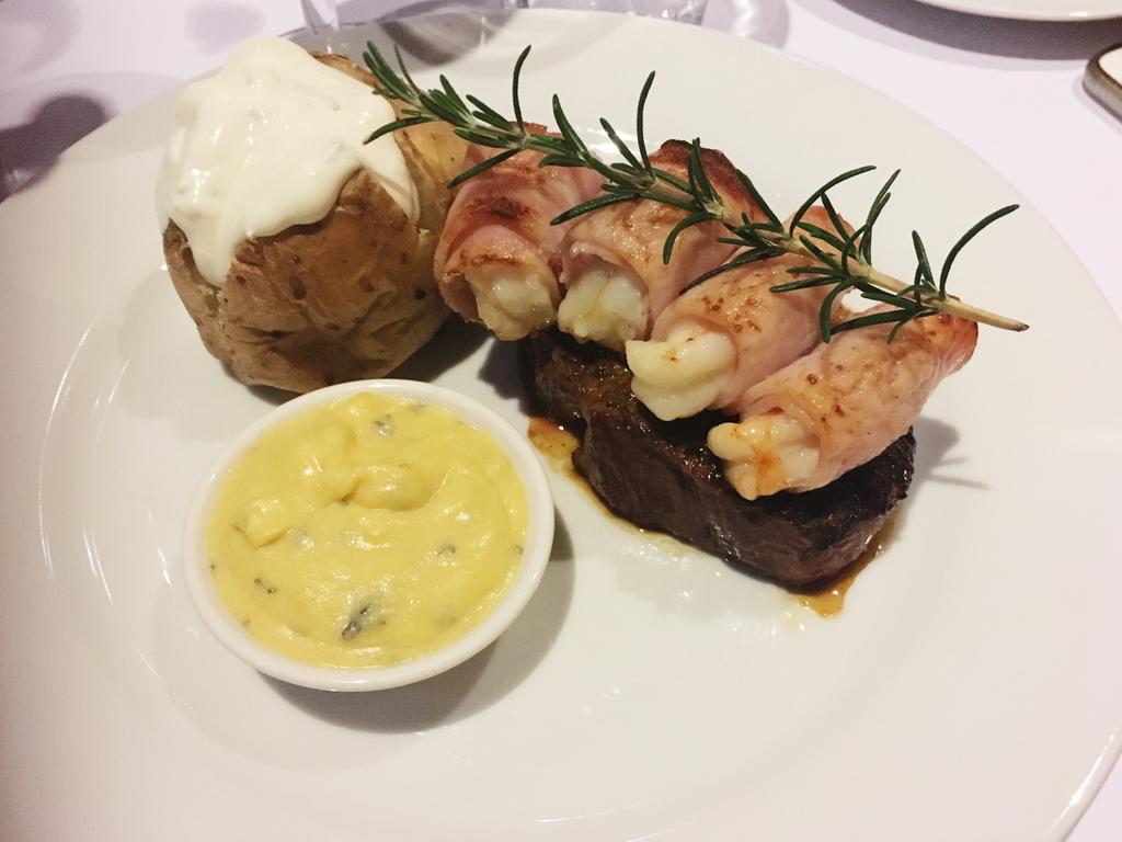 Graze -  Cork & Cleaver is celebrating 40 years - Surf & Turf (Fillet steak, Morton Bay bugs & prawns wrappe in bacon with béarnaise sauce)