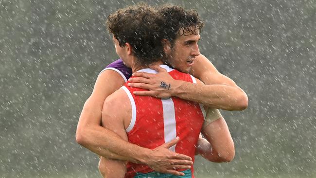 Saints Max King and Nick Coffield aren’t bothered by a bit of December rain.